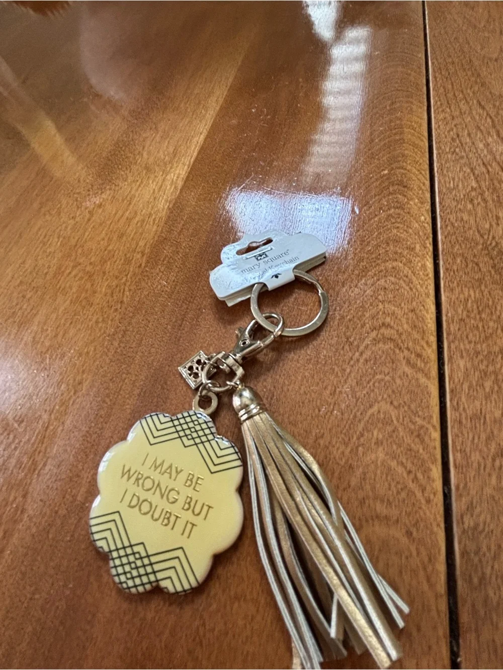 Cream Enamel Keychain with Gold Lettering - Unbranded